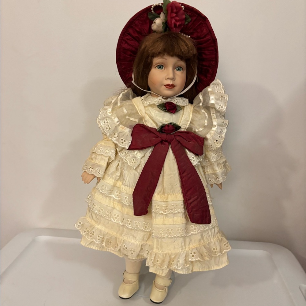 Elegant Cream and Red Porcelain Doll Vanessa brand